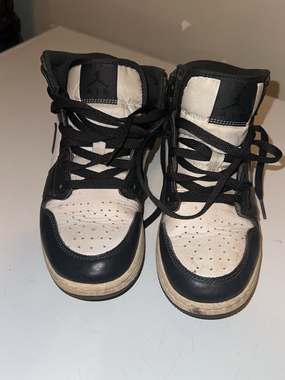Jordan Kids Black and White High-Top Sneakers